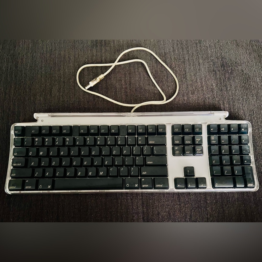 Apple Pro Keyboard  Model M7803  Clear Cover  Black Keys  2 USB Ports.